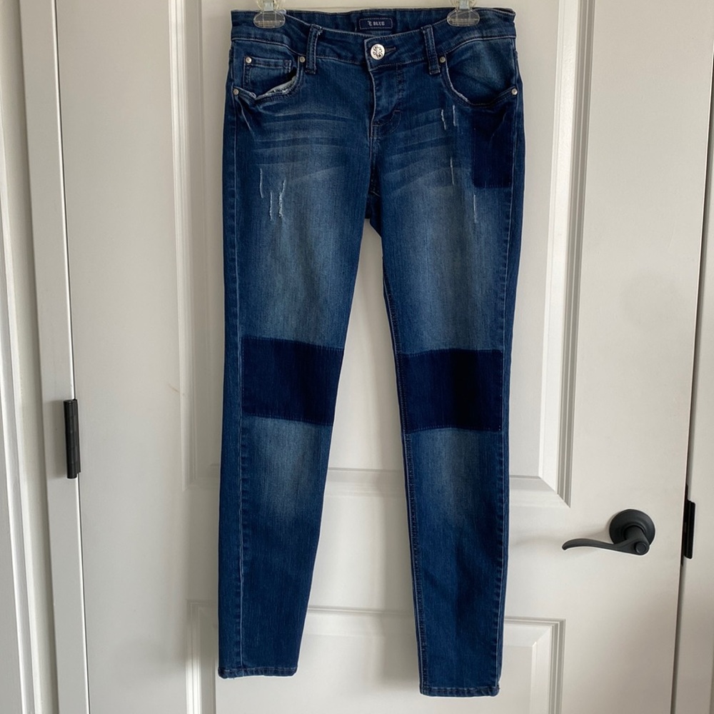 Jeans with patches over knees